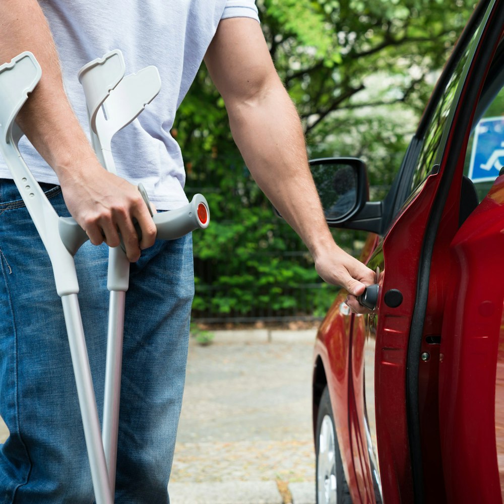 Injured person walking to car